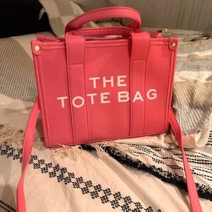 The tote bag cross body hot pink mini